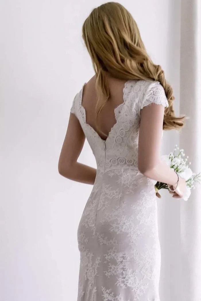 Vestido de novia de sirena con mangas cortas, encaje satinado y abertura